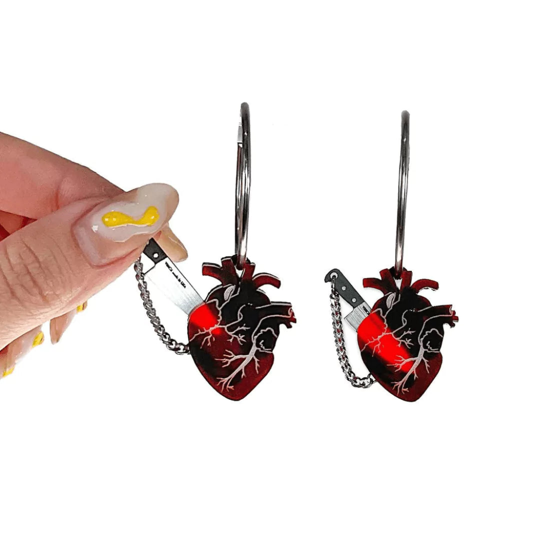 Earrings cut in heart