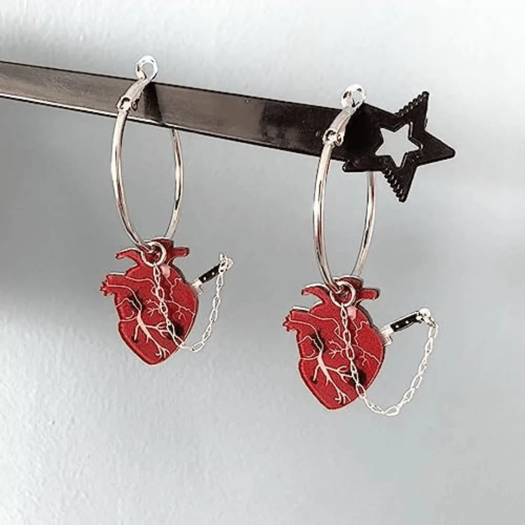 Earrings cut in heart